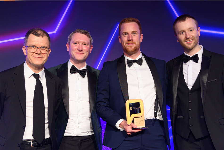 ebi's Ashley Owen. Harry Hitchcock and Nick Walker receiving the Professional Adviser Best MPS Award in March 2024.