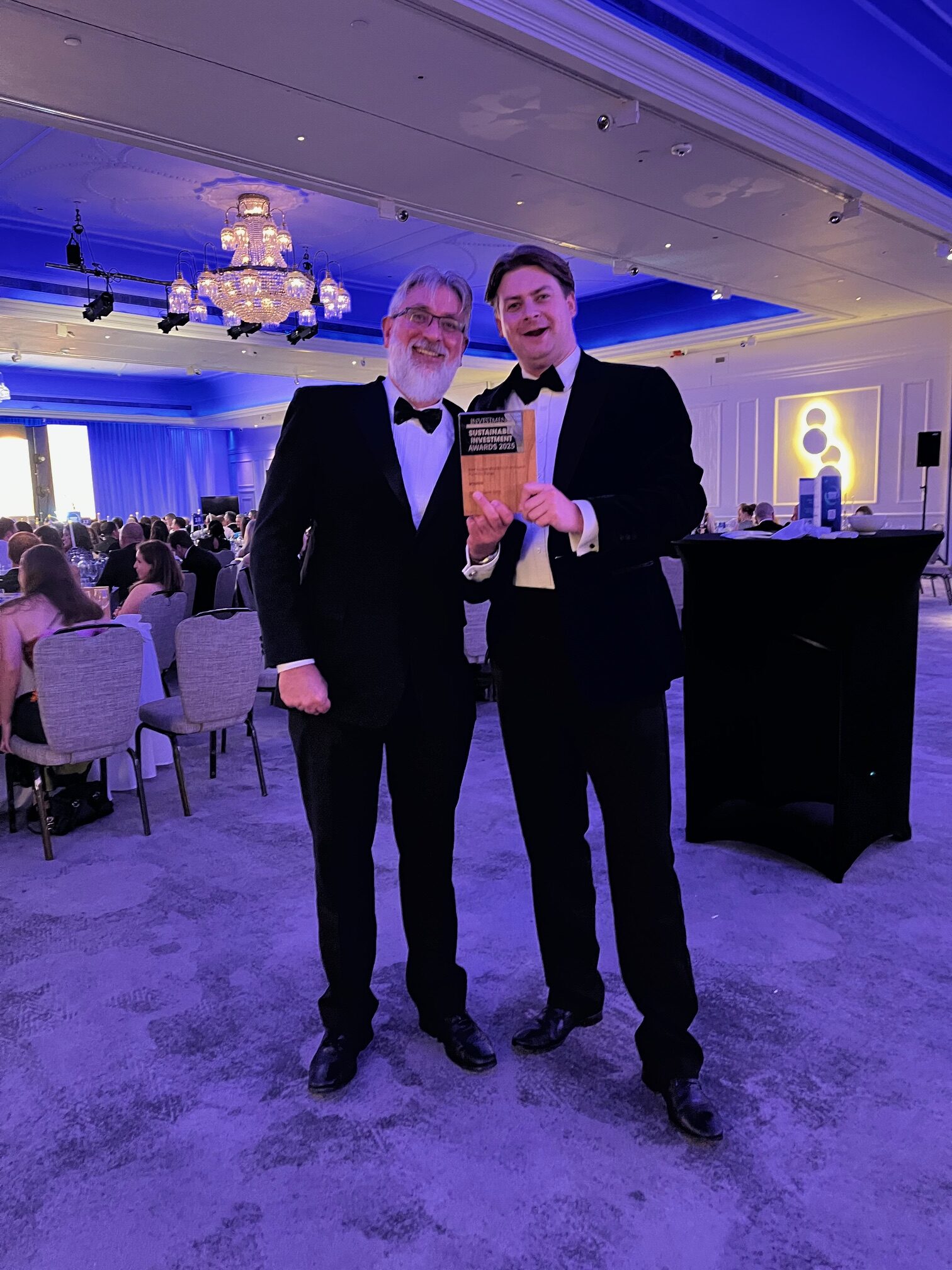 ebi's Ashley Owen and Thomas Ranft holding the Money Marketing Award