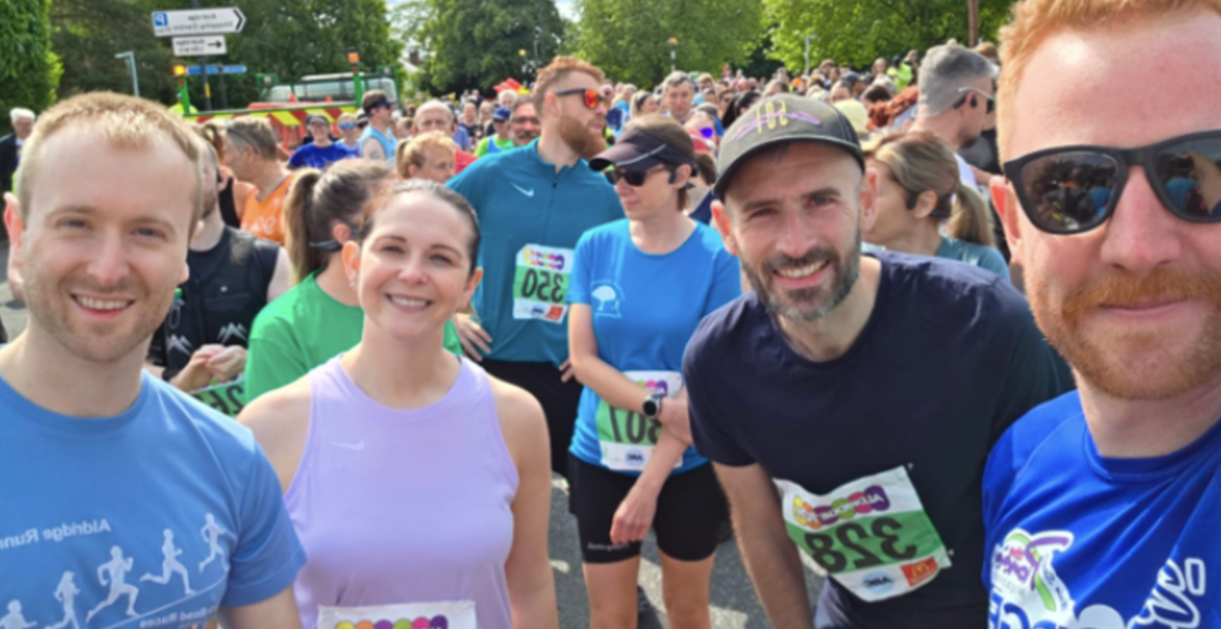 EBI team members Nick Walker, Claire Gittus, Jason Murphy, and Harry Hitchcock at the Aldridge 10k event.