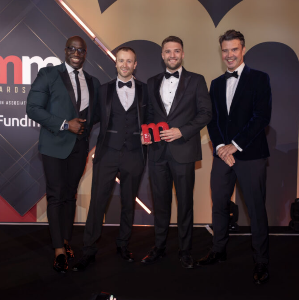 ebi team receiving Best Outsourced Investment Manager Award at Money Marketing Awards 2025